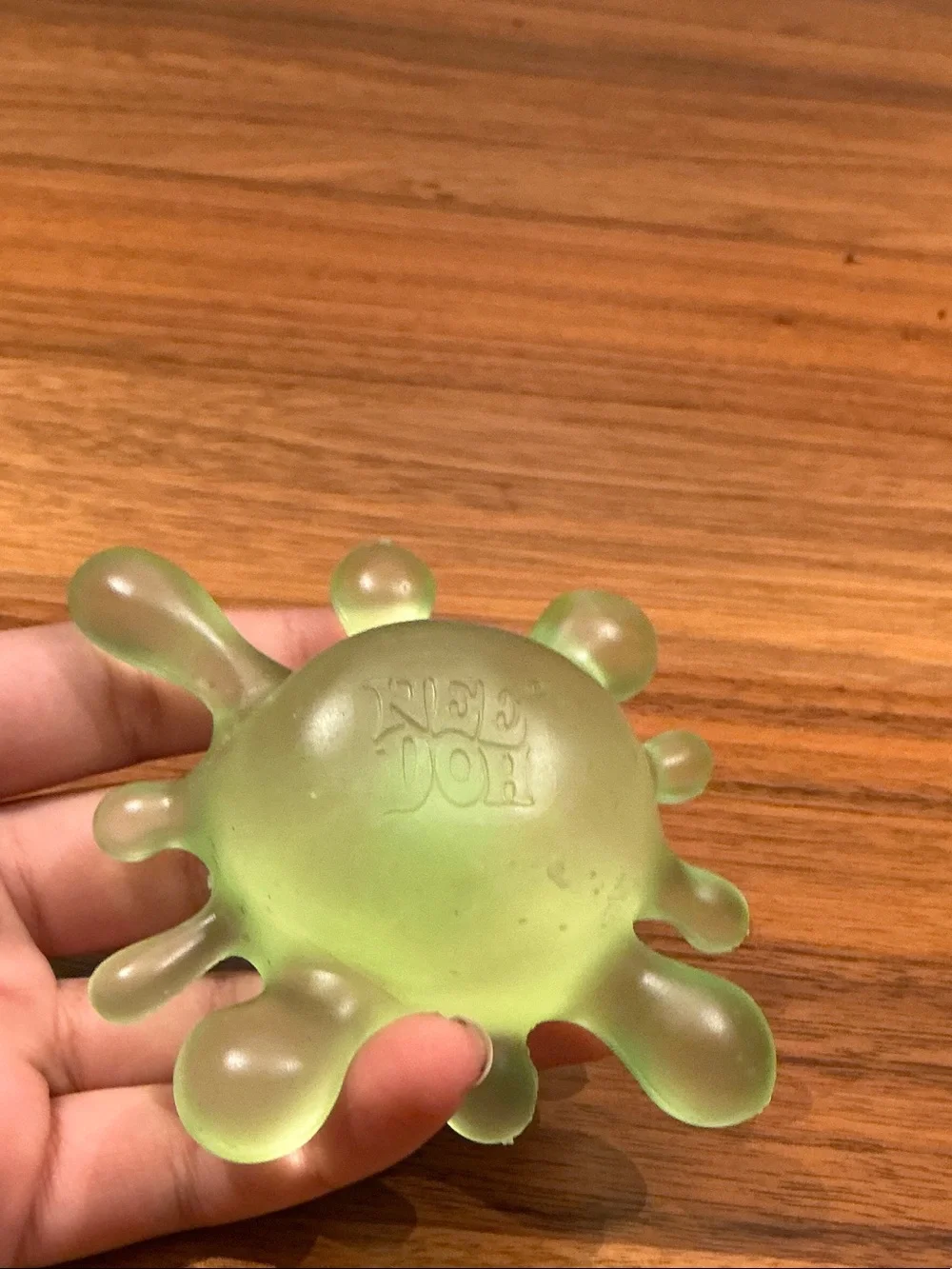 Green NeeDoh Splook SplatSensory Grip Toy